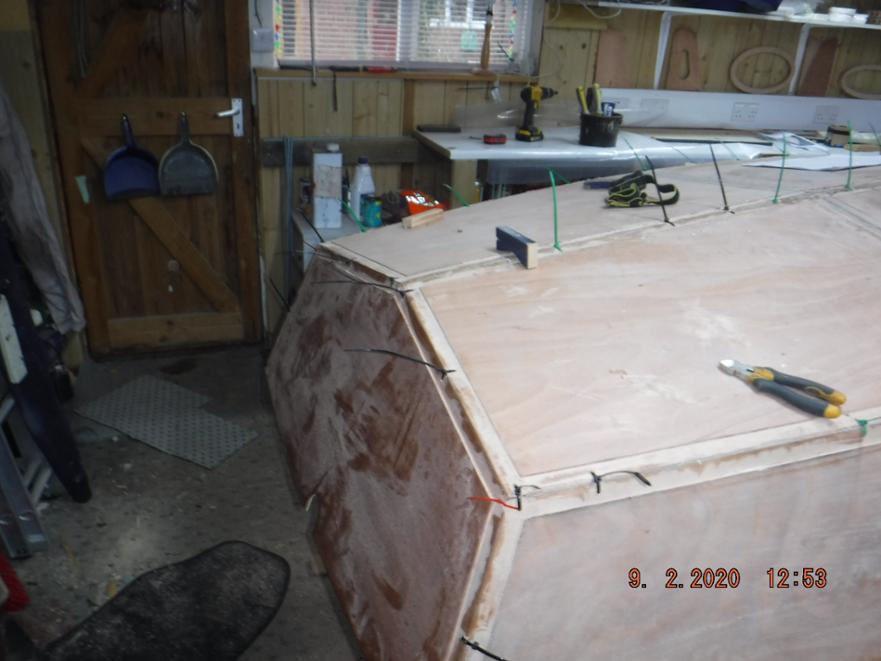 The Mistley boat in progress showing stern section with routed prep for joint taping. 
