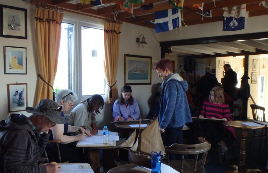 Ketches and Sketches. Claudia Myatt teaching people how to draw their own boats at Tollesbury SC © Alison Cable 2017 