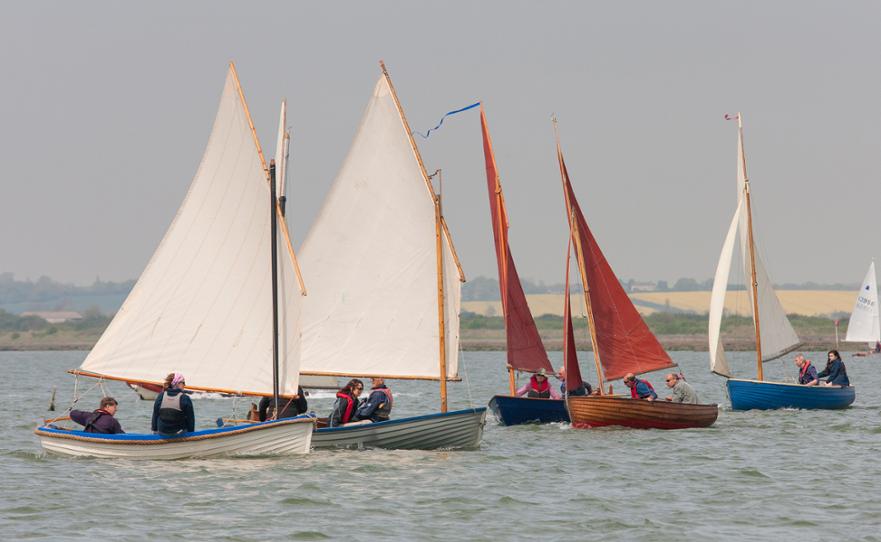 Small boats race, Tollesbury
A swarm of smacks boats, GP14s, winklebrigs and Mirrors enjoy the race © Tony Pickering 2016 