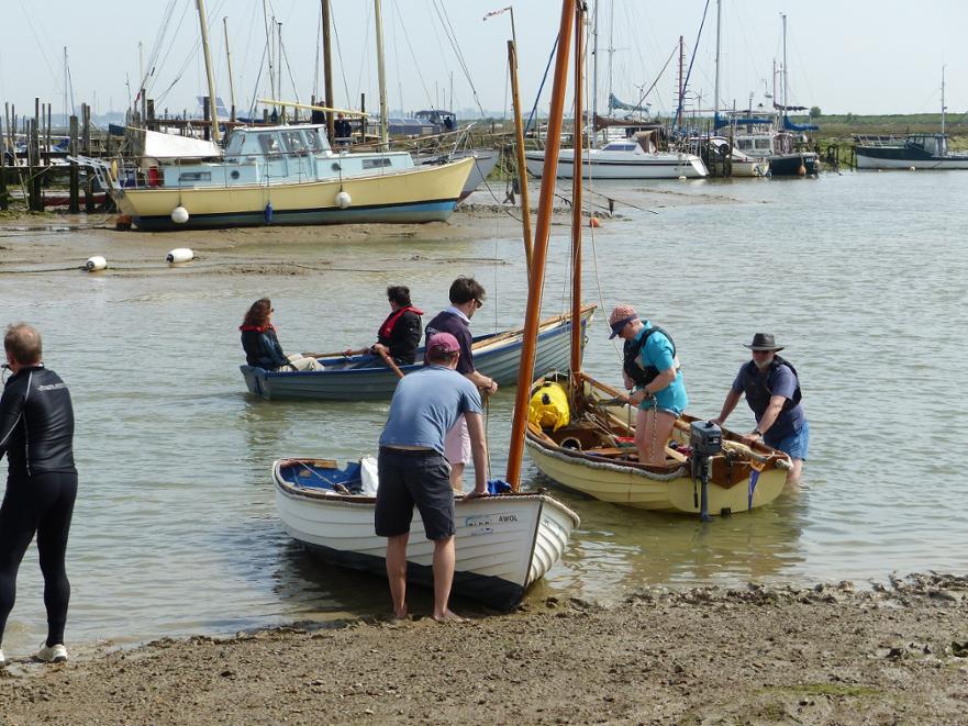 Launching smacks boats. Clive Robertson and Nick launch AWOL with Papa Stour (Pete the Knife and Sarah) at Tollesbury 2016. © Sue Lewis 2016 