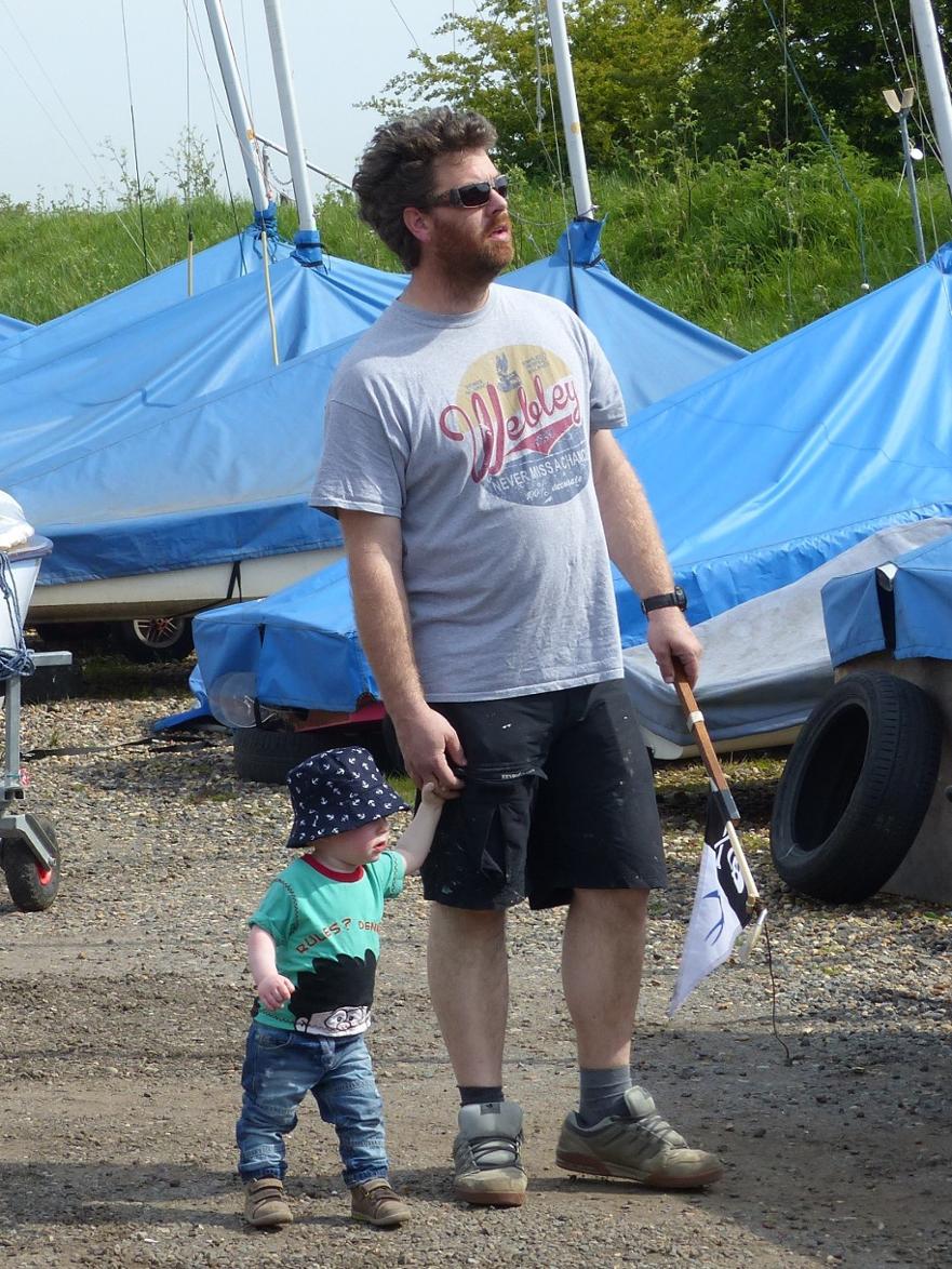 Rory and son Henry. Before the race at Tollesbury 2016, Rory sorting out a burgee with help of son Henry © Sue Lewis 2016 