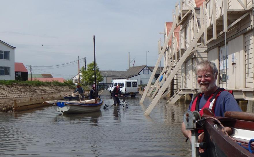 Towing boats home. High tides force dinghies to take to the road in 2016 © Alison Cable 2016 