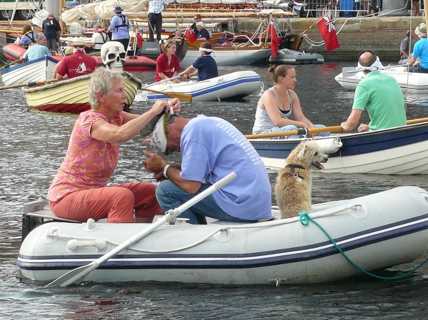 Lena Reekie, Bob Berk and Matey preparing for the blindfold rowing race ©Sue Lewis 