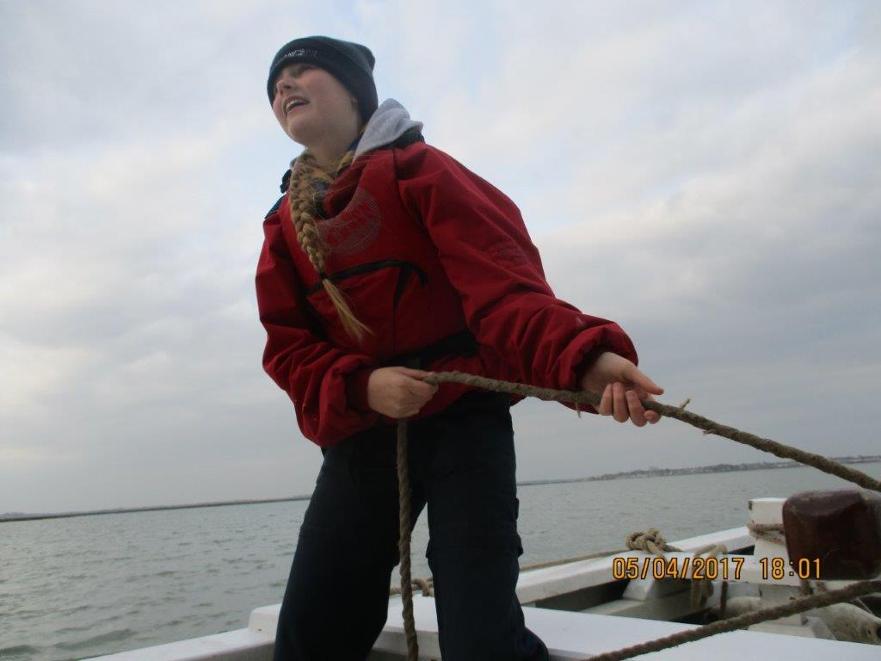Young Sea Scout helming smack Sallie ©Richard Tichener 
