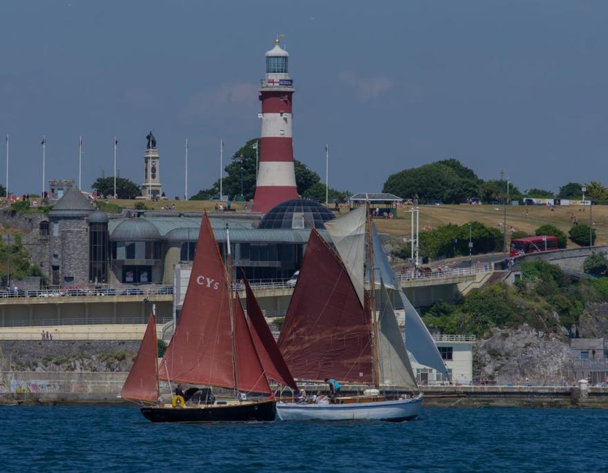Minx and Demelza passing Smeatons Tower. ©Jane Bryan 
