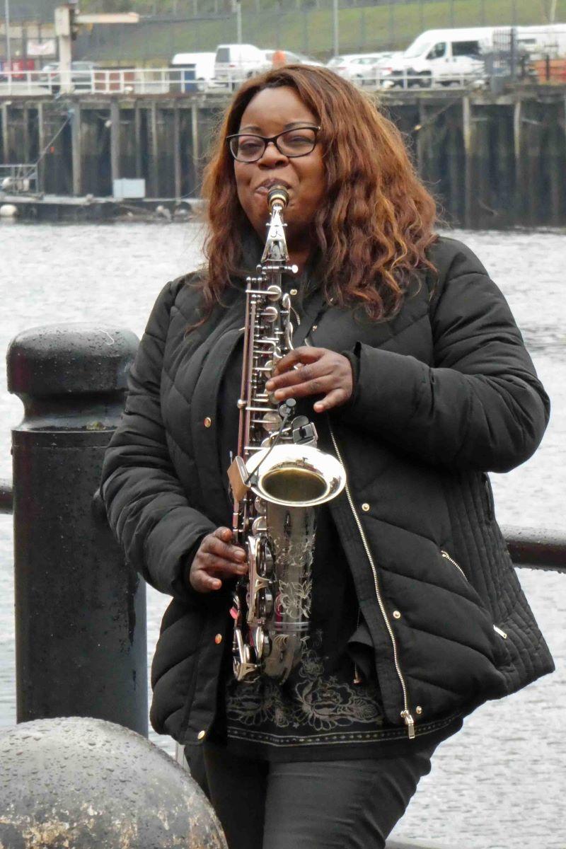 15: Newcastle - Cheerful busker ©Viv Head 2022 